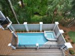 View of Pool and Hot Tub from Second Floor Balcony at 29 Pelican